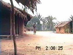 The above-mentioned old woman is talking loudly.The meeting house in on the right, and the kitchen on the left.